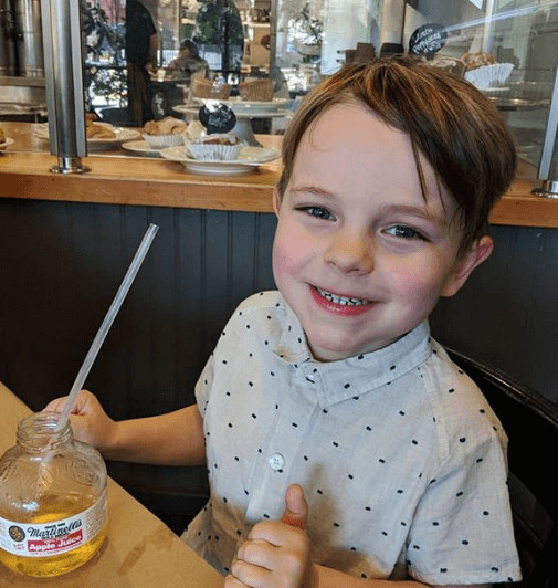 Jocelin Donahue Son Drinking Apple Juice